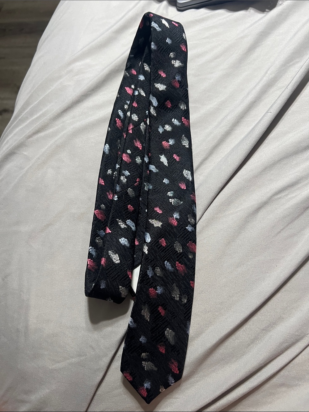 Black Skinny Tie with Pink and Gray Speckle Pattern
